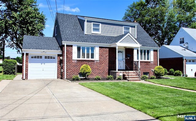 37 Winslow Ter, Fair Lawn, NJ 07410 - bungalow with brick siding, an attached garage, driveway, and a front yard