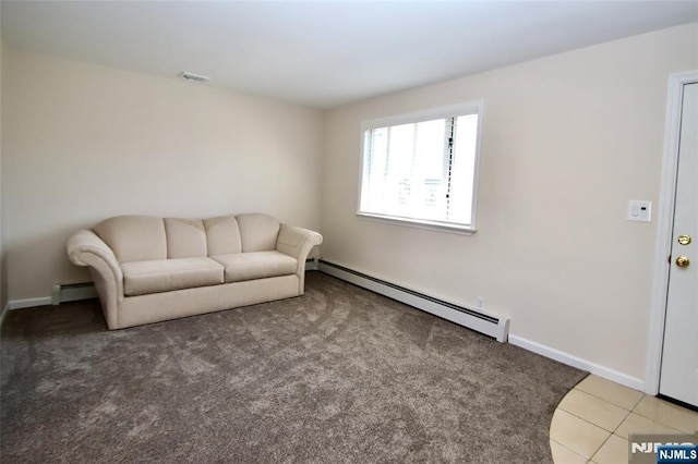37 Winslow Ter, Fair Lawn, NJ 07410 - living area featuring a baseboard radiator, light carpet, baseboards, and light tile patterned floors