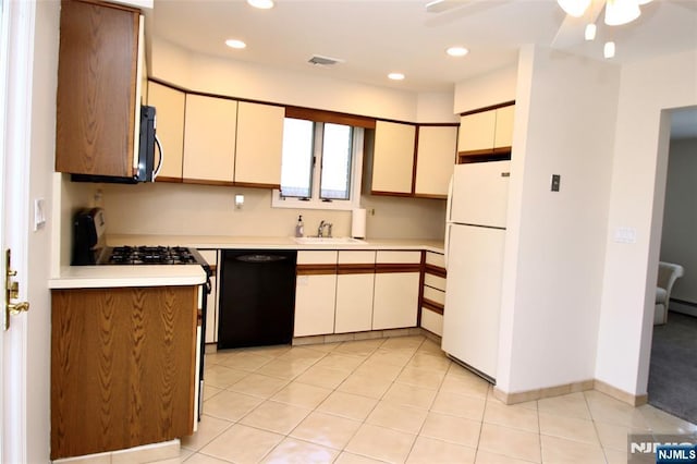 37 Winslow Ter, Fair Lawn, NJ 07410 - kitchen with freestanding refrigerator, dishwasher, light countertops, range with gas stovetop, and stainless steel microwave