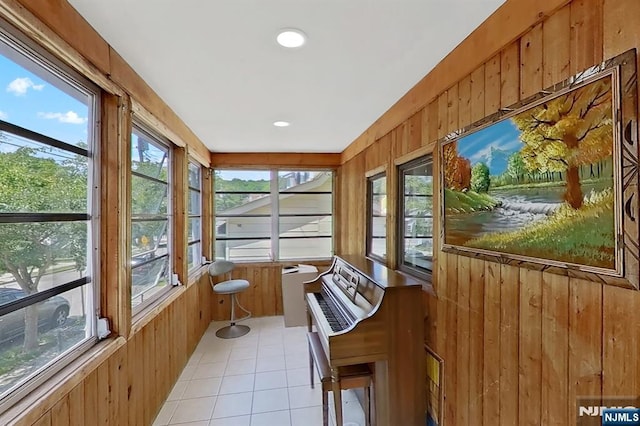 107 Elm St, West Orange, NJ 07052 - sunroom with wood walls, tile patterned flooring, and recessed lighting