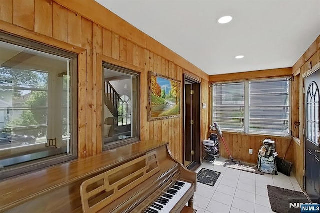 107 Elm St, West Orange, NJ 07052 - sunroom / solarium with wooden walls, plenty of natural light, and tile patterned floors