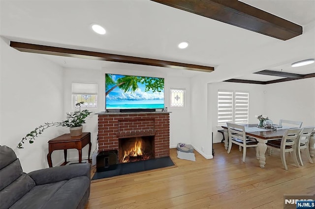 107 Elm St, West Orange, NJ 07052 - living room featuring beamed ceiling, hardwood / wood-style floors, a brick fireplace, recessed lighting, and baseboards