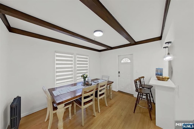 107 Elm St, West Orange, NJ 07052 - dining room featuring radiator, beam ceiling, light wood-style floors, and baseboards