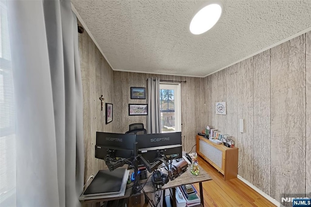 107 Elm St, West Orange, NJ 07052 - office area with wood finished floors, a textured ceiling, wood walls, and crown molding