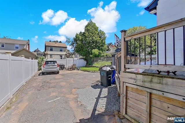 107 Elm St, West Orange, NJ 07052 - view of parking / parking lot featuring a residential view