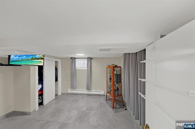 107 Elm St, West Orange, NJ 07052 - basement featuring baseboard heating