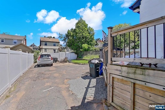 107 Elm St, West Orange, NJ 07052 - view of vehicle parking with a residential view