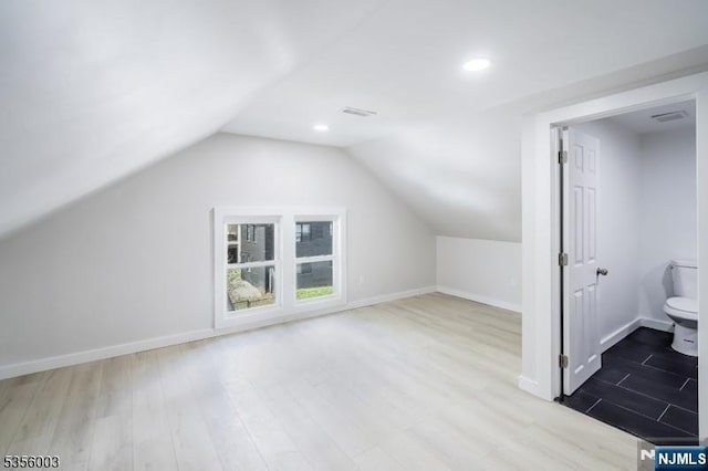 90 N Grove St, East Orange, NJ 07017 - bonus room featuring wood finished floors, baseboards, lofted ceiling, and recessed lighting