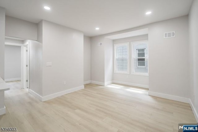 90 N Grove St, East Orange, NJ 07017 - unfurnished room featuring light wood-style floors, baseboards, and recessed lighting