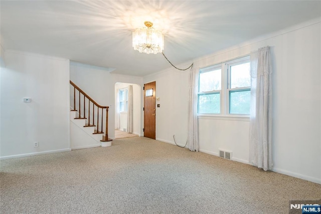33 Lorelei Rd, West Orange, NJ 07052 - entrance foyer featuring a chandelier, stairway, carpet floors, and baseboards