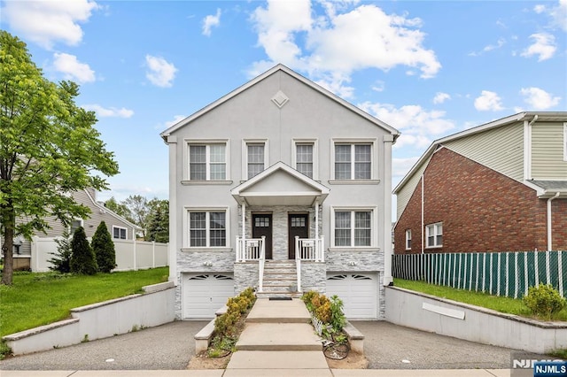 15 Kossuth St, Wallington, NJ 07057 - view of property featuring asphalt driveway, stone siding, an attached garage, stucco siding, and stairway