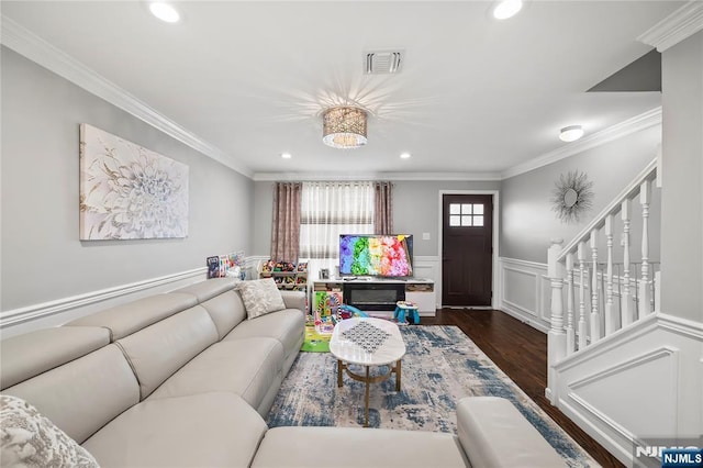 15 Kossuth St, Wallington, NJ 07057 - living room featuring wood finished floors, crown molding, wainscoting, recessed lighting, and stairs