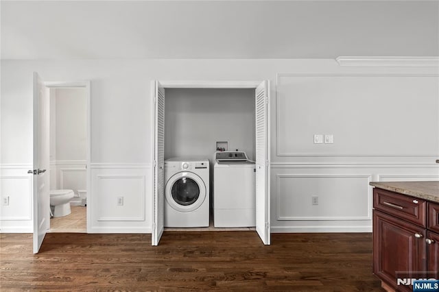 15 Kossuth St, Wallington, NJ 07057 - laundry area with a decorative wall, independent washer and dryer, dark wood-type flooring, and wainscoting