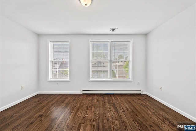 15 Kossuth St, Wallington, NJ 07057 - unfurnished room with baseboard heating, baseboards, and dark wood finished floors