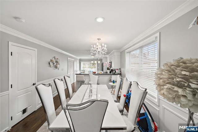 15 Kossuth St, Wallington, NJ 07057 - dining area featuring a chandelier, ornamental molding, and dark wood-style flooring