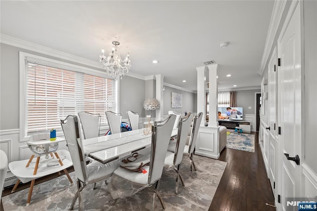 15 Kossuth St, Wallington, NJ 07057 - dining room featuring ornamental molding, a decorative wall, a chandelier, dark wood-style floors, and decorative columns