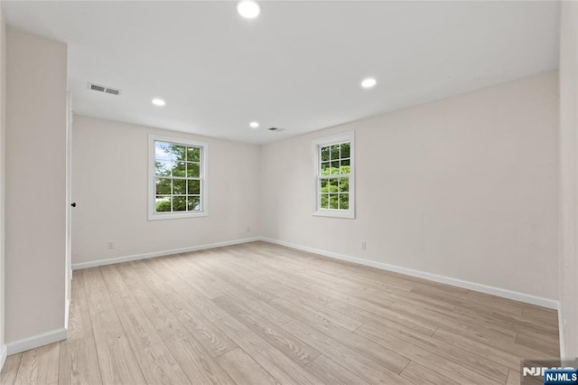 428 Elm Ave, River Edge, NJ 07661 - unfurnished room with light wood-style flooring, baseboards, and recessed lighting