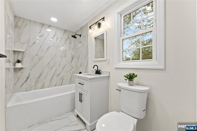 428 Elm Ave, River Edge, NJ 07661 - full bath featuring marble look tiles, vanity, toilet, healthy amount of natural light, and recessed lighting