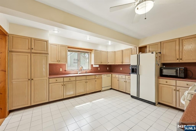 650 5th Ave, River Edge, NJ 07661 - kitchen with white appliances, a sink, light brown cabinetry, light tile patterned floors, and ceiling fan