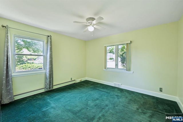 650 5th Ave, River Edge, NJ 07661 - unfurnished room with dark colored carpet, a ceiling fan, healthy amount of natural light, and baseboards