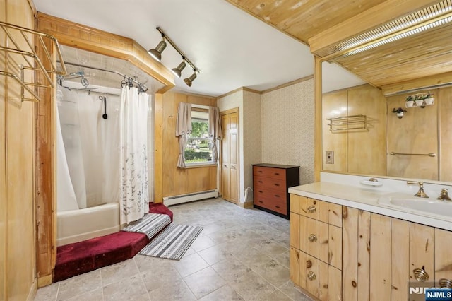 650 5th Ave, River Edge, NJ 07661 - bathroom featuring a baseboard heating unit, vanity, shower / bath combo with shower curtain, and tile patterned flooring