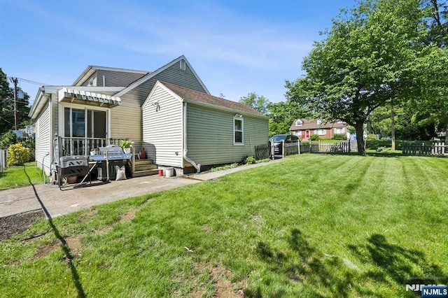 650 5th Ave, River Edge, NJ 07661 - rear view of house featuring a patio