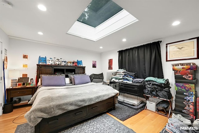 712 Undercliff Ave, Edgewater, NJ 07020 - bedroom featuring a skylight, light wood finished floors, and recessed lighting