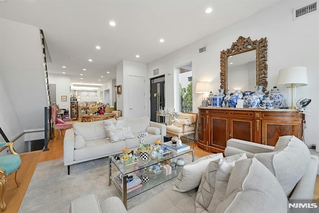 712 Undercliff Ave, Edgewater, NJ 07020 - living room with recessed lighting and light wood-style flooring