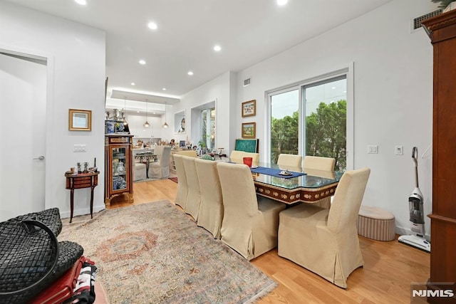 712 Undercliff Ave, Edgewater, NJ 07020 - dining room with light wood-style flooring and recessed lighting
