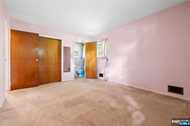 30 Fox Hill Rd, Fairfield, NJ 07004 - unfurnished bedroom with carpet, a closet, ensuite bath, and baseboards