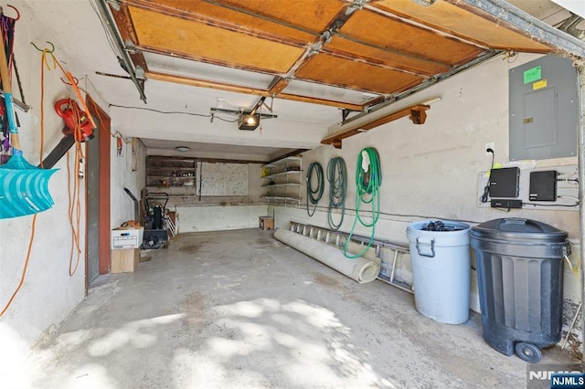 30 Fox Hill Rd, Fairfield, NJ 07004 - garage with electric panel and a garage door opener