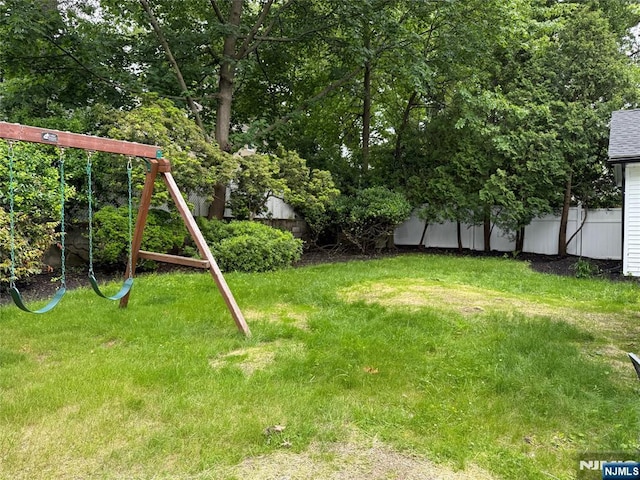 41 Woods Ave, Bergenfield, NJ 07621 - view of yard featuring a playground