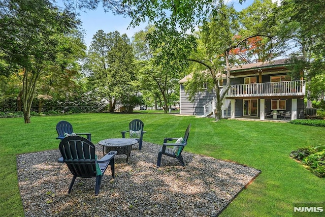104 Myrtle Ave, Ramsey, NJ 07446 - view of grassy yard with a patio, stairway, a wooden deck, and a fire pit