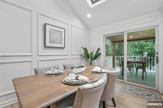 104 Myrtle Ave, Ramsey, NJ 07446 - dining space with a decorative wall, lofted ceiling, a skylight, light wood finished floors, and recessed lighting