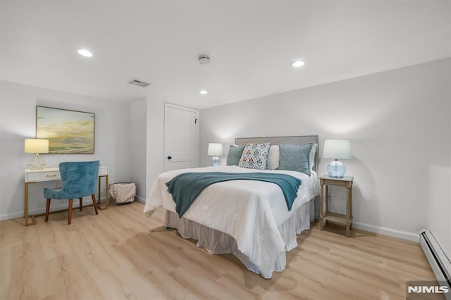 104 Myrtle Ave, Ramsey, NJ 07446 - bedroom with baseboard heating, wood finished floors, and recessed lighting