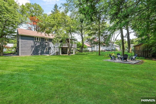 104 Myrtle Ave, Ramsey, NJ 07446 - view of yard with a fire pit, stairway, and a wooden deck
