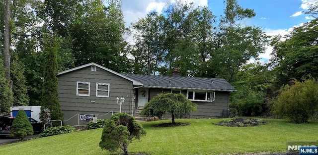128 Up High Crest Rd, West Milford, NJ 07480 - rear view of property featuring a lawn and a chimney