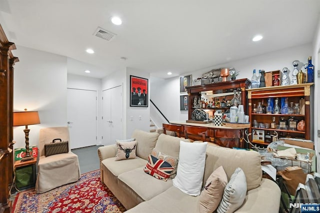 716 Undercliff Ave, Edgewater, NJ 07020 - living room with a bar, stairway, and recessed lighting