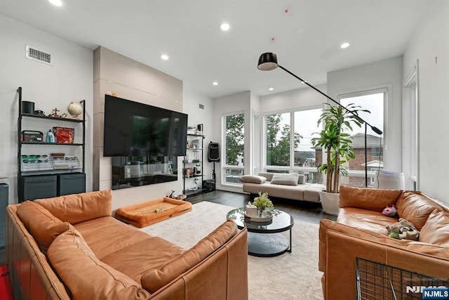 716 Undercliff Ave, Edgewater, NJ 07020 - living room featuring recessed lighting and wood finished floors