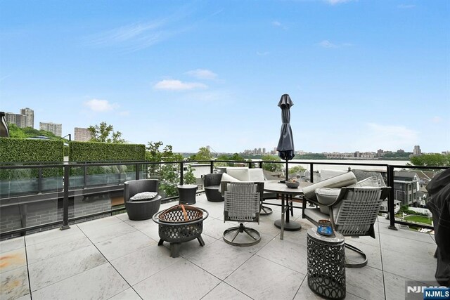 716 Undercliff Ave, Edgewater, NJ 07020 - view of patio with a fire pit