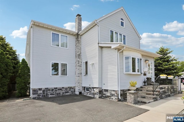 300 Wilson Ave, Lyndhurst, NJ 07071 - view of side of home with a chimney