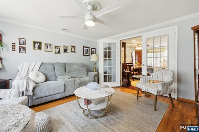 300 Wilson Ave, Lyndhurst, NJ 07071 - living area featuring ceiling fan, crown molding, wood finished floors, and french doors
