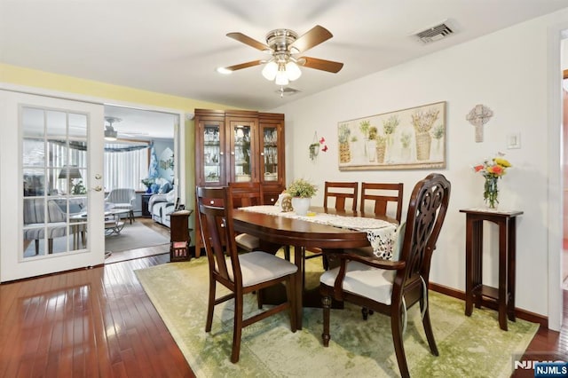 300 Wilson Ave, Lyndhurst, NJ 07071 - dining space with a ceiling fan, wood-type flooring, and baseboards