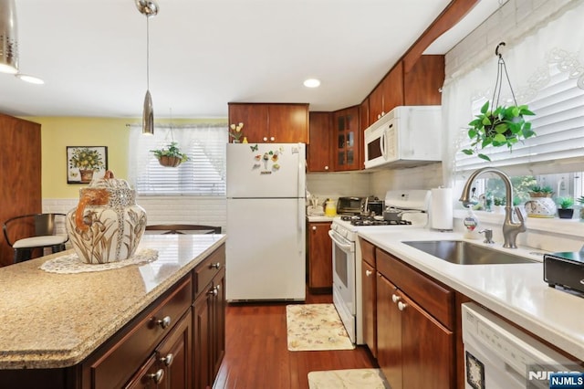 300 Wilson Ave, Lyndhurst, NJ 07071 - kitchen with white appliances, a sink, plenty of natural light, dark wood finished floors, and recessed lighting