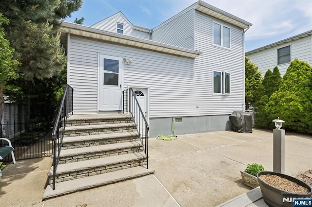 300 Wilson Ave, Lyndhurst, NJ 07071 - rear view of house with crawl space, a patio, and a gate