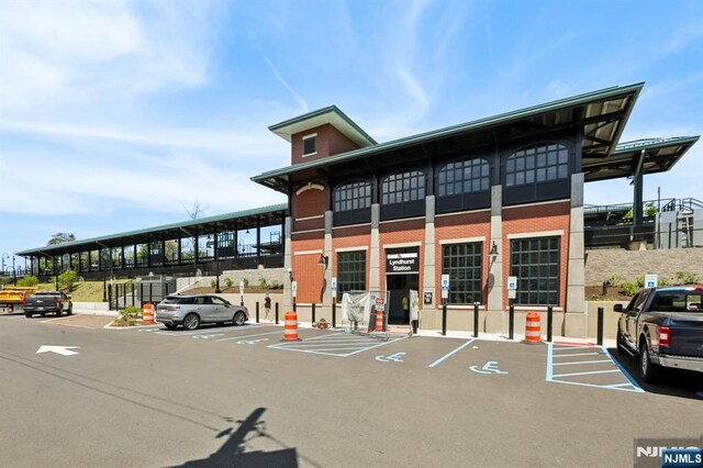 300 Wilson Ave, Lyndhurst, NJ 07071 - view of commercial property with uncovered parking