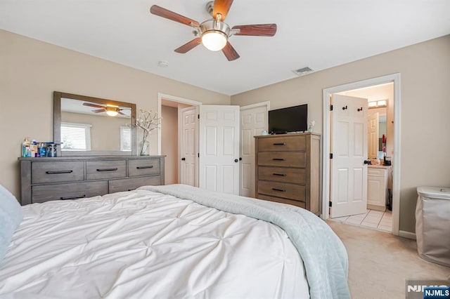 101 Royal Ave Unit 40, Hawthorne, NJ 07506 - bedroom with light colored carpet, ensuite bathroom, and ceiling fan
