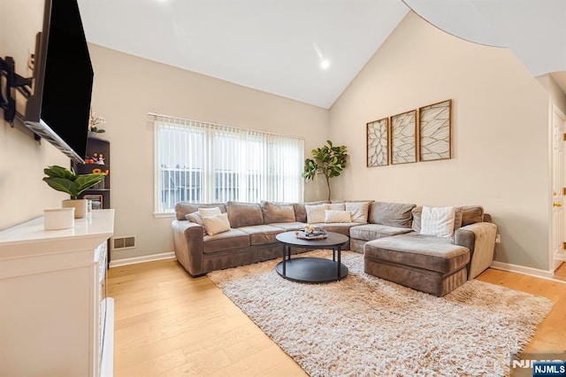 101 Royal Ave Unit 40, Hawthorne, NJ 07506 - living area with light wood finished floors, baseboards, high vaulted ceiling, and recessed lighting