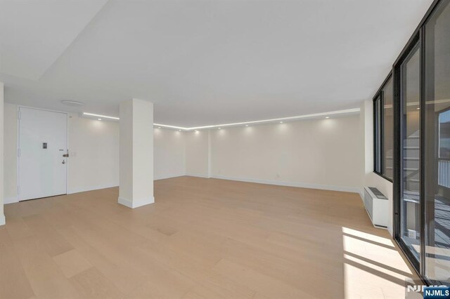 200 Winston Unit 2912, Cliffside Park, NJ 07010 - below grade area with light wood-style floors and baseboards