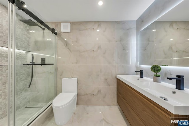 200 Winston Unit 2912, Cliffside Park, NJ 07010 - bathroom with tile walls, a stall shower, double vanity, toilet, and marble finish floors